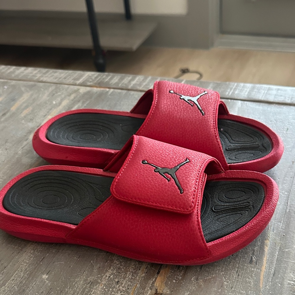 Jordan Hydro 6 kids Slides in a red and black colorway